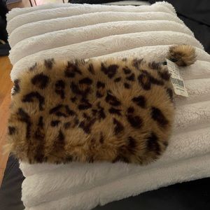 Barney’s faux fur clutch